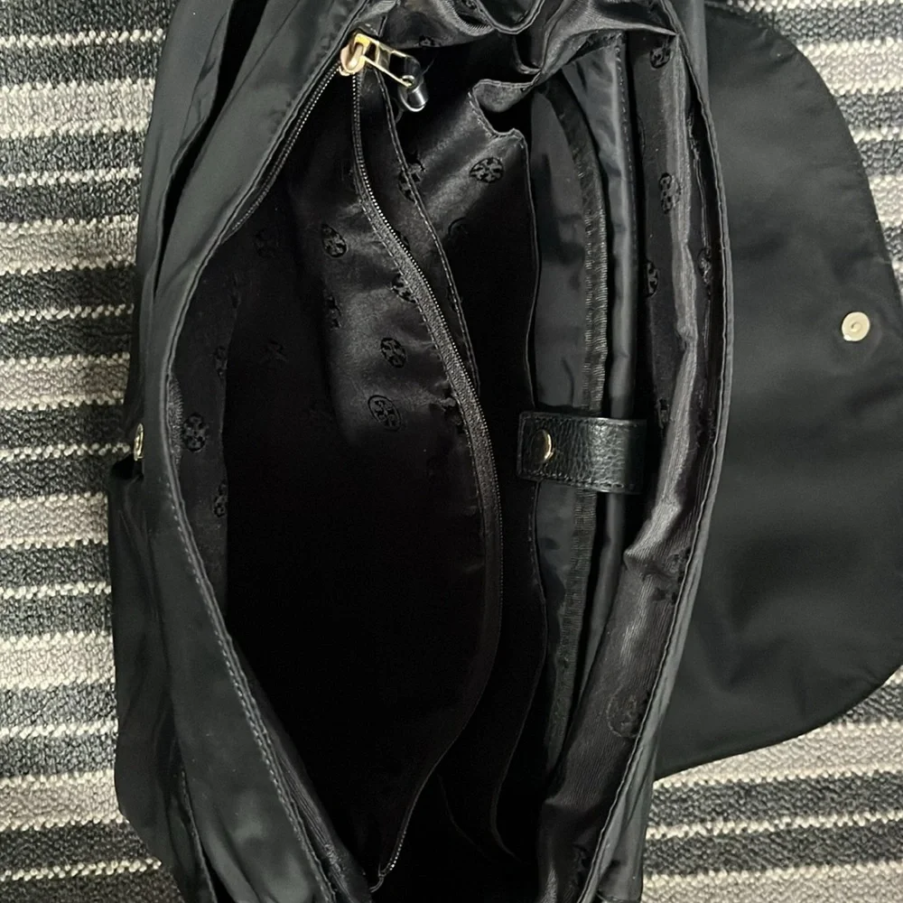 Tory Burch diaper bag. Gently used. black. Includes changing pad.